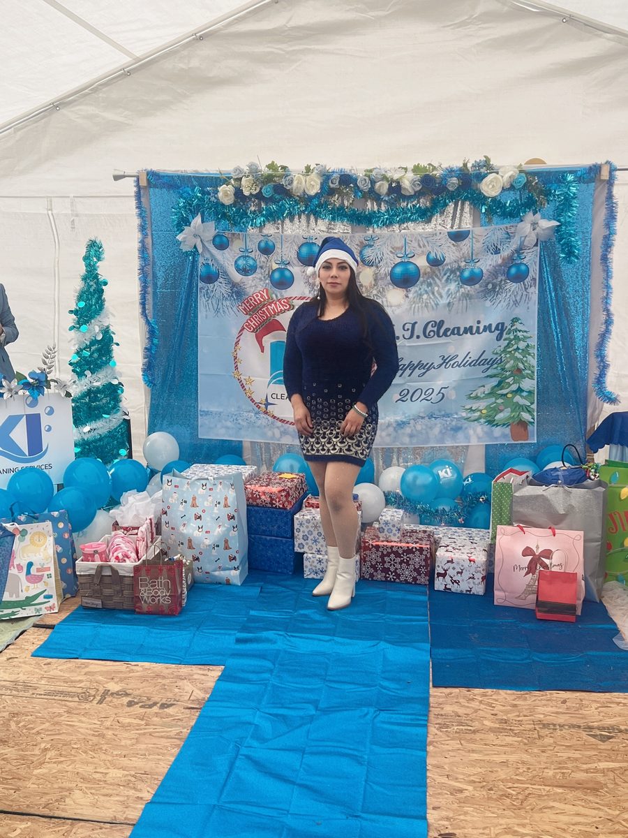A KI Cleaning team member celebrating at the company's holiday gathering